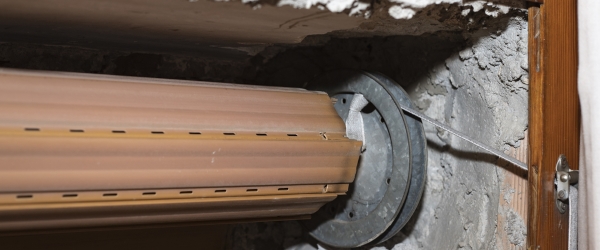 Rolling shutter repair, open box containing a broken roller shutter